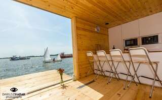 Апартаменты HT Houseboats- domki na wodzie Mielno Мельно Дом на воде HT3 с 2 спальнями, камином, сауной и моторной лодкой-10